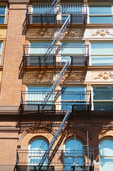 apartment buildings with emergency stairs in Little Italy neighborhood of Manhattan