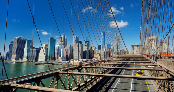 Spectacular skyline of lower Manhattan from Brooklyn Bridge, New York