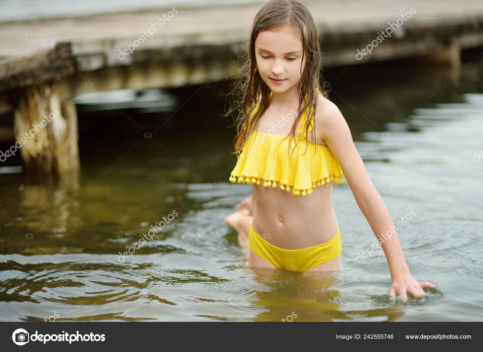 Girl in river Photos
