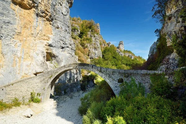 Traditional arched stone bridge of Zagori region in Northern Greece. Iconic bridges were mostly built during the 18th and 19th centuries by local master craftsmen using local stone.