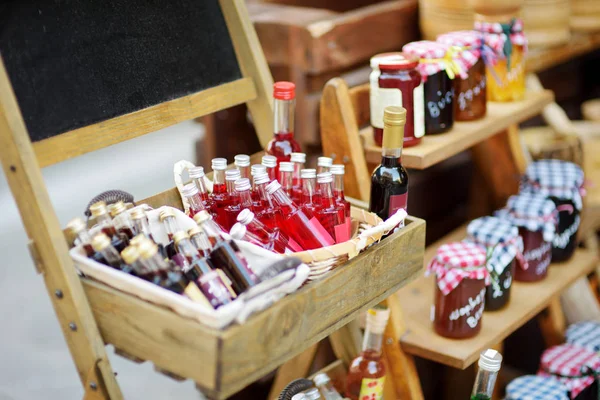 Various goods sold at small shops at the pedestrian area at center of Kalavryta town near the square and odontotos train station, Greece.