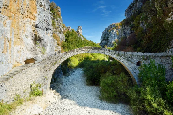 Traditional arched stone bridge of Zagori region in Northern Greece. Iconic bridges were mostly built during the 18th and 19th centuries by local master craftsmen using local stone.