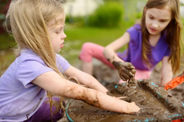 Two Funny Little Girls Playing Large Wet Mud Puddle Sunny — Stock Photo, Image