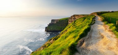 World famous Cliffs of Moher, one of the most popular tourist destinations in Ireland. Widely known tourist attraction on Wild Atlantic Way in County Clare. clipart