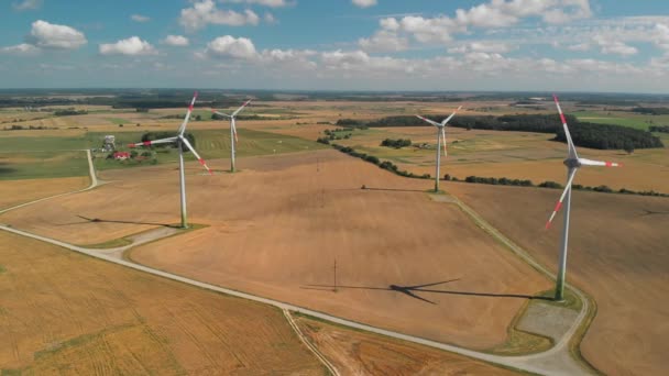 Aerial view of spinning wind turbines — Stock Video