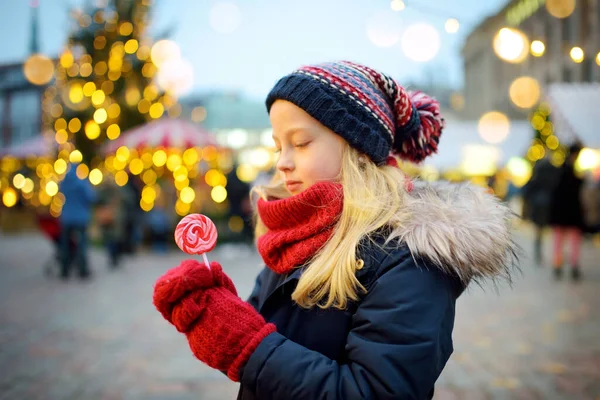 Cute Young Girl Having Striped Lollipop Traditional Christmas Fair Riga — Stock Photo, Image