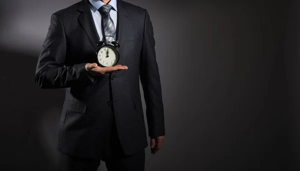 Businessman Elegant Suit Holding Alarm Clock Showing Hours — Stock Photo, Image