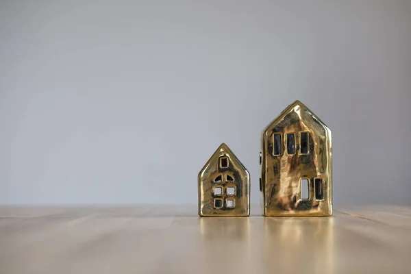 Two Mock Ups Buildings Painted Gold Stand Wooden Surface Space — Stock Photo, Image