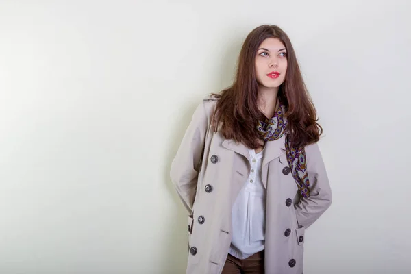 Portrait Happy Young Woman Light Raincoat White Wall — Stock Photo, Image