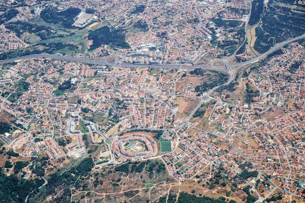 The air view of Bem Me Quer condominium in the form of the eye in Charneca de Caparica parish. Almada. Portugal