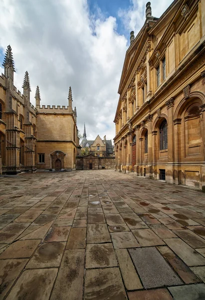 The view of the old yard of the Oxford University surrounded by Divinity School,  Chancellor\'s court, Bodleian Library and Sheldonian Theater. Oxford. England