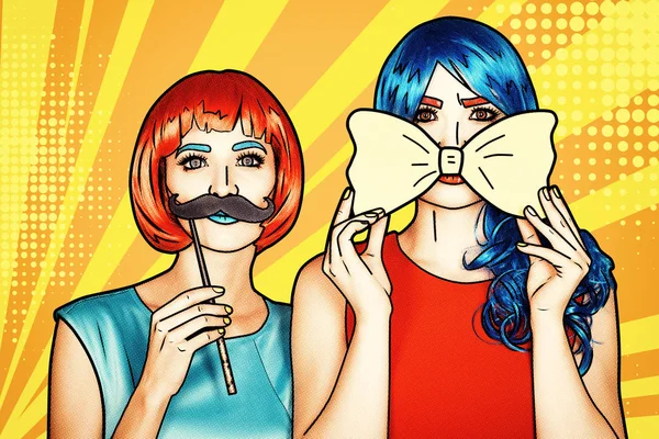 Portrait of young women in comic pop art make-up style. Females in red and blue wigs on yellow - orange cartoon background. Girls with yellow bow-tie fnd false moustashes in hands