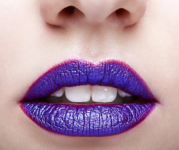 Woman with violet lips makeup