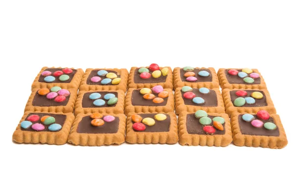 Biscuits Chocolat Avec Des Gouttes Colorées Isolées Sur Fond Blanc — Photo
