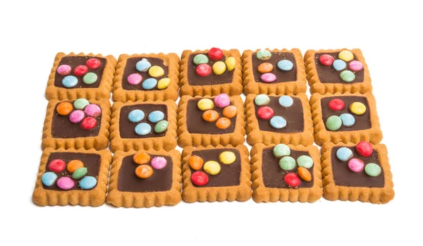 Koekjes Met Chocolade Gekleurde Jelly Beans Geïsoleerd Witte Achtergrond — Stockfoto