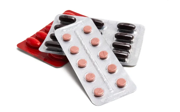 Medicinsk kapslar i pack isolerade — Stockfoto