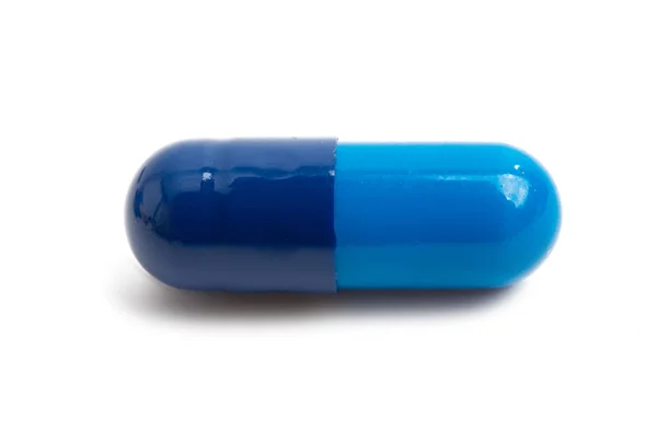 Blue capsules isolated — Stock Photo, Image