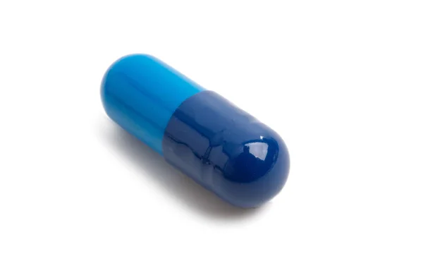 Blue capsules isolated — Stock Photo, Image