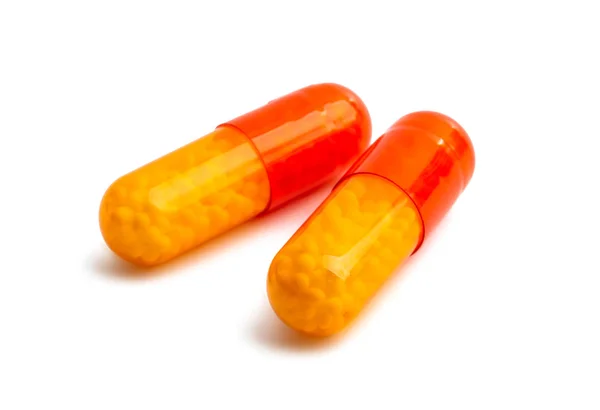 Capsule met vitamine C geïsoleerd — Stockfoto