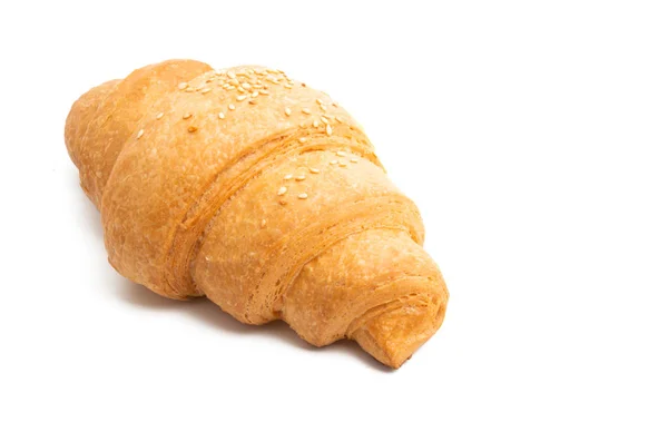 Grote croissant geïsoleerd — Stockfoto