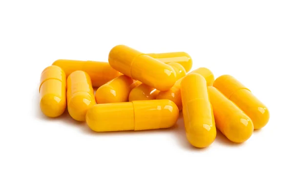 Yellow capsules isolated — Stock Photo, Image