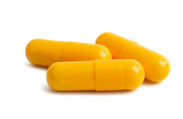 Izole sarı kapsül — Stok fotoğraf