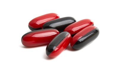 izole kırmızı kapsül 