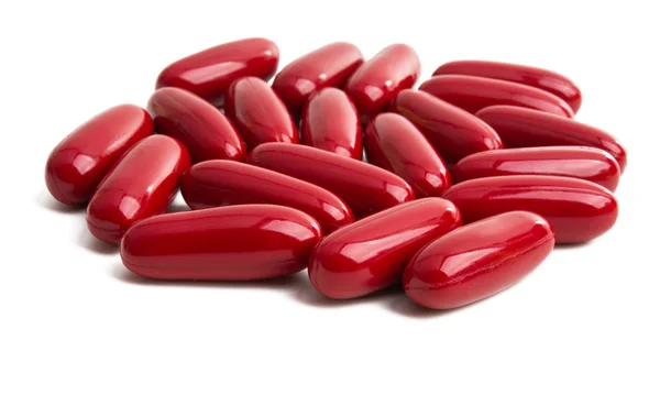 Red capsule isolated — Stock Photo, Image