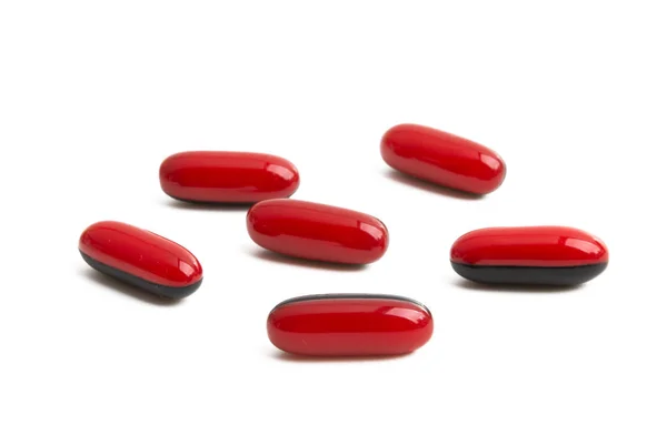 Red capsule isolated — Stock Photo, Image