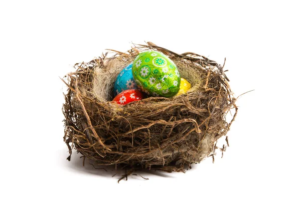Chocolate egg in a bird's nest — Stock Photo, Image