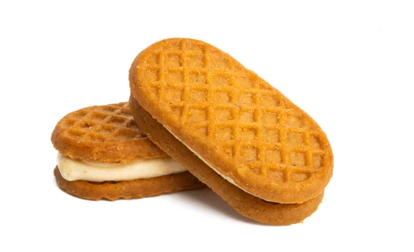 Sándwich de galletas con crema de leche aislada — Foto de Stock