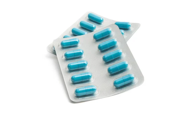 Pack of blue capsules isolated — Stock Photo, Image