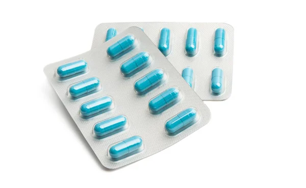 Pack of blue capsules isolated — Stock Photo, Image