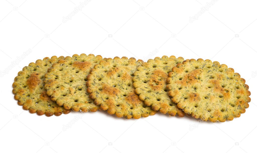 salted cracker with herbs isolated on white background