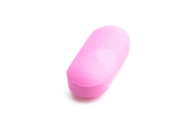 白色背景下分离出的粉红药丸 — 图库照片