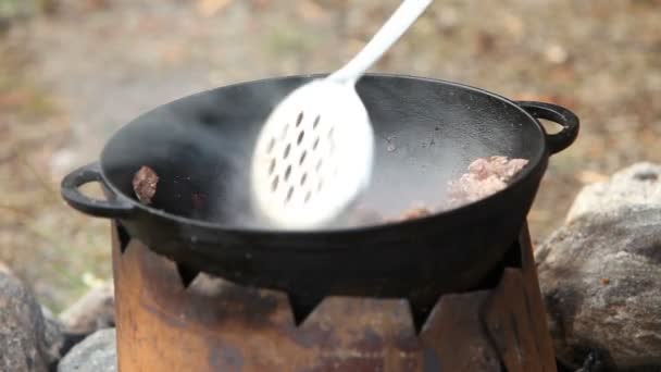 Cooking Meat Cauldron Outdoors — Stock Video