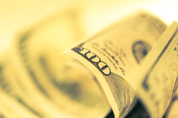 Close-Up Nézd amerikai dollár milliokról pénzt. Pénzügyi és üzleti koncepció. Sekély mélység-ból mező. — Stock Fotó