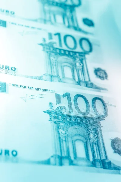 Vista de perto do fundo das notas de euro em numerário. Finanças e tema de negócios. Profundidade de campo rasa — Fotografia de Stock