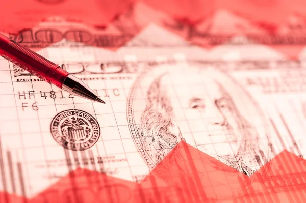 Finance background with money, stock market chart, graph and pen. Living coral toned.