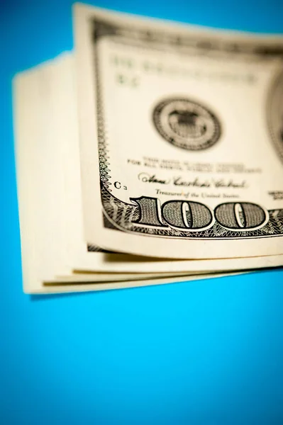 Primo piano vista di denaro contante dollari bollette sfondo. Tema finanza e affari . — Foto Stock