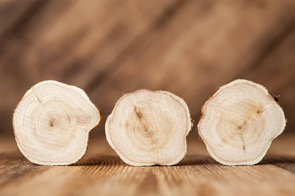 Texture of cross section juniper wood. Pattern of tree stump background. Circles slice of juniper.