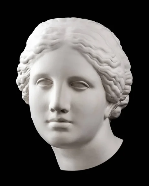 Copia de yeso de la antigua estatua Venus cabeza aislada sobre fondo negro. Escultura de yeso cara de mujer. — Foto de Stock