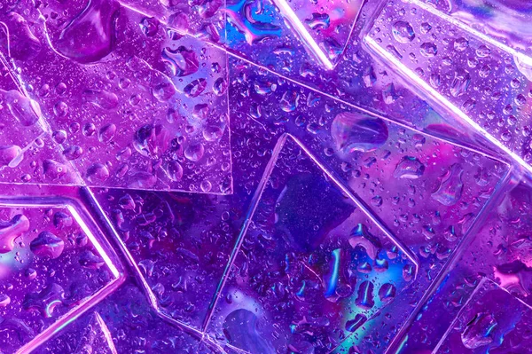 Antecedentes no estilo dos anos 80-90. Textura real de vidro quebrado e gotas em cores de ácido brilhante . — Fotografia de Stock