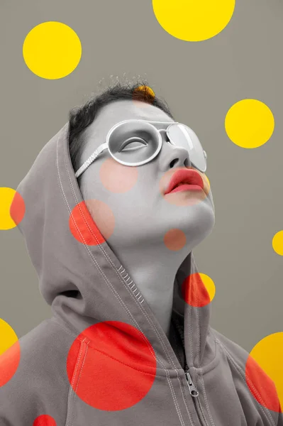 Art collage with alternative funky girl. Close up fashion portrait young beautiful woman in hoodie and white strange glasses with eye. Multi-colored circles. Unusual youth fashion concept. — Stock Photo, Image