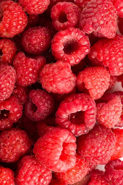 pile of fresh  raspberries, texture of berries