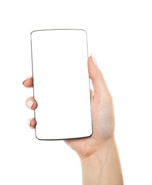 İzole kadın el beyaz dağ eteğindeki taş yığını ile bir telefon tutarak