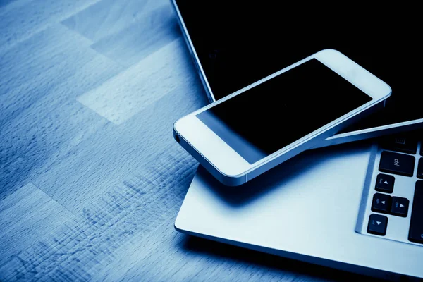 Keyboard Phone Tablet Wooden Desk Blu — Stock Photo, Image