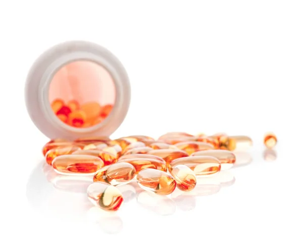 Shiny Yellow Vitamin Fish Oil Capsule Spilling Out Pill Bottle — Stock Photo, Image
