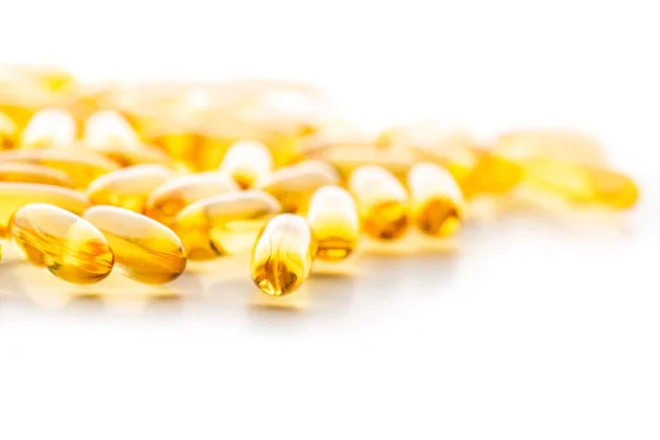 Közelkép Sárga Tablettákat Elszigetelt Fehér Felület — Stock Fotó