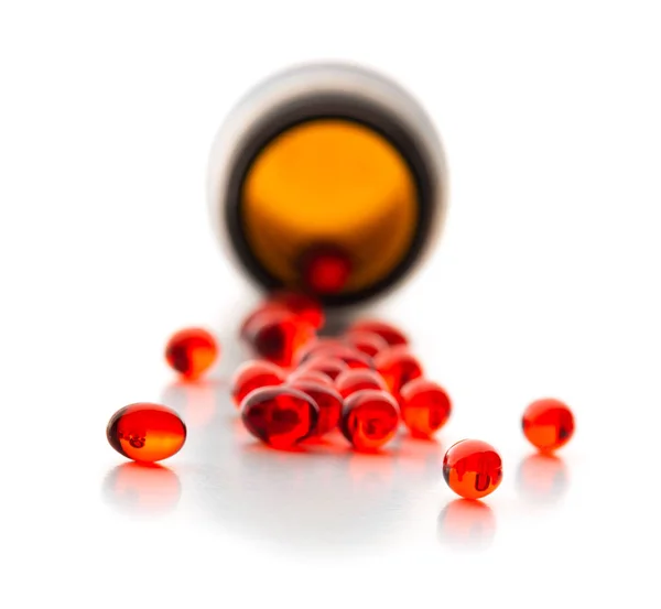 Piros Kapszula Tabletta Üveg Elkülönített Felett Fehér Háttér Stock Kép